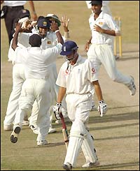 Michael Vaughan is out for 105