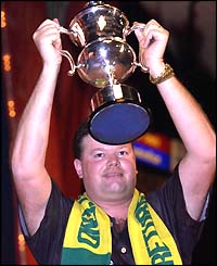 Raymond van Barneveld celebrates victory in the 2003 World Professional Darts championship