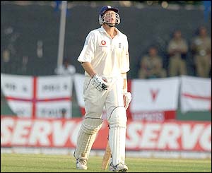 Ashley Giles walks from the crease after being run out