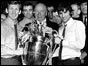 Sir Matt Busby with Pat Crerand and George Best holding European Cup