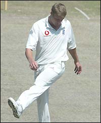 Andrew Flintoff kicks the ground in frustration