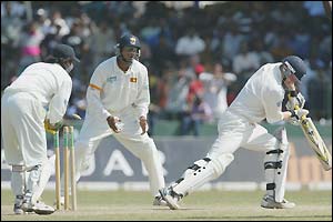 Gareth Batty suffers the same fate just a ball later as Kumar Sangakarra whips the bails off