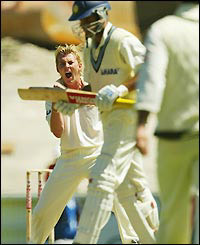 Brett Lee celebrates his second wicket of the match