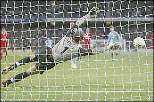 Nicolas Anelka scores a penalty for Man City