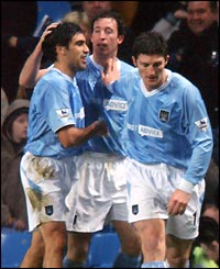 Robbie Fowler celebrates his last-gasp equaliser against Liverpool