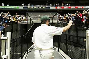 Fans applaud Waugh from the MCG for the final time