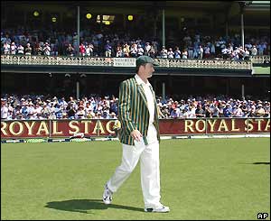 Australian captain Steve Waugh walks out for the toss in front of a packed Sydney Cricket Ground before the start of his final Test