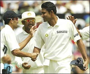 Spinner Anil Kumble of India is congratulated on his eight-wicket haul