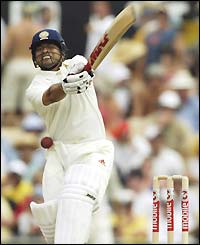 India's Sachin Tendulkar is hit on the head by a quick Brett Lee delivery