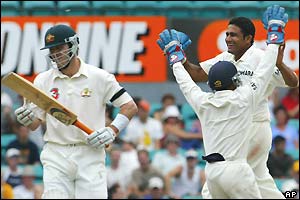 Damien Martyn leaves the crease after being dismissed