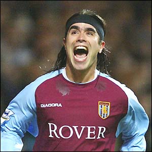 Juan Pablo Angel wheels away in delight after scoring his 14th goal of the season