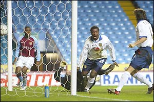 Yakubu Ayegbeni's puts Portsmouth right back in it after heading home Patrik Berger's free kick early in the second half