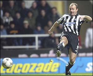 Alan Shearer scores for Newcastle against Liverpool