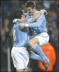 Robbie Fowler and Joey Barton celebrate Manchester City's goal