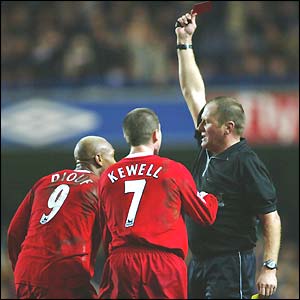 Liverpool's El Hadji Diouf is shown the red card by referee Steve Dunn