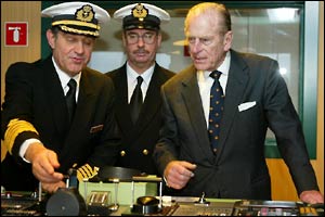 Duke of Edinburgh shown the controls of the Cunard liner