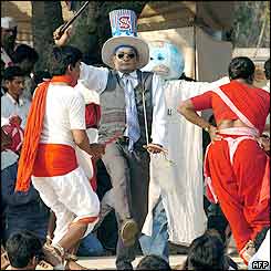 An Indian dance troop performs an anti-US capitalism dance during the opening ceremony 