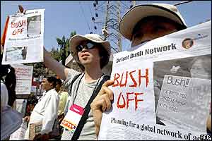 holds anti-US President George Bush pamphlet