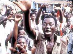 People celebrating after Amin's downfall