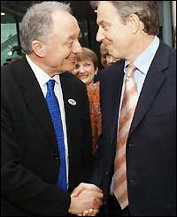 Ken Livingstone shakes hands with Prime Minister Tony Blair