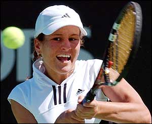 Aniko Kapros plasy a shot in her upset win over Nadia Petrova