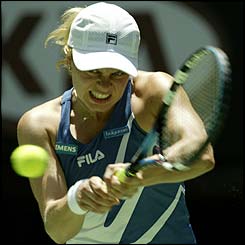 Kim Clijsters grits her teeth on her way to a 6-0 6-0 win
