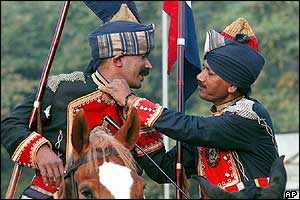 Mounted soldiers check each other's livery in the run-up to the Republic Day parade