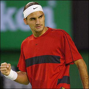 Roger Federer celebrates his victory over David Nalbandian 