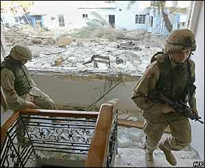 US soldiers near the scene of the blast