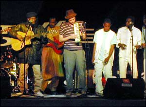 Malian musician Afel Bocoum (l) accompanied by British musician Damon Albarn (r)