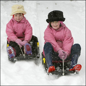 Girls on sleighs