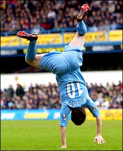 Robbie Keane performs his trademark cartwheel celebration after scoring