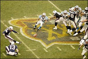 New England Patriots Adam Vinatieri strikes a field goal