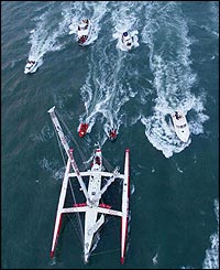 An aerial view of IDEC arriving in Brest harbour