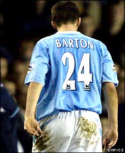 Joey Barton trudges off the pitch