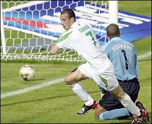 Algeria's Abdelmalek Cherrad celebrates scoring against Morocco