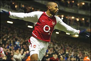 Thierry Henry celebrates his 100th Premiership goal for Arsenal