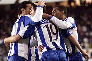 Deportivo La Coruna players mob goalscorer Alberto Luque