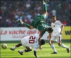 Jose Clayton and Hoalid Regragui tangle for the ball 