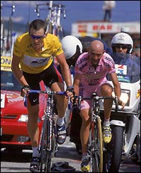 Lance Armstrong rides just ahead of Marco Pantani during stage 12 of the 2000 Tour de France