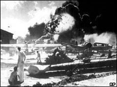 US aircraft in flames as Japanese planes bomb Pearl Harbor
