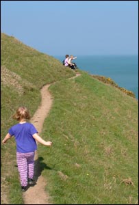 Mark Adams and family on a coastal walk in Pembrokeshire