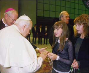 After performing for the Pope the previous December, Charlotte met him on January 13 1999