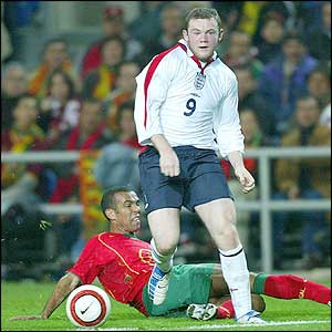 Wayne Rooney has a shot on goal