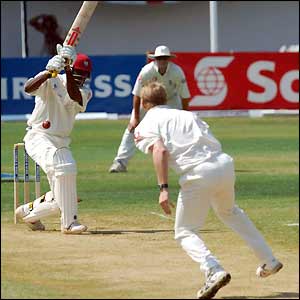 Windies opener Chris Gayle fends off a ball from Matthew Hoggard