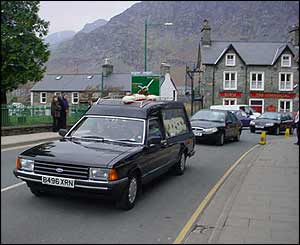 The funeral cortege for Dorothy Evans makes its way from the church to Bethesda cemetery