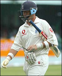 Hussain walks back to the pavilion after his dismissal