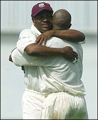 Tino Best is congratulated after claiming the wicket of Chris Read
