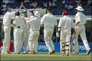 Ramnaresh Sarwan is trapped lbw by Harmison