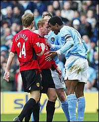 United's Nicky Butt and Sylvain Distin of City